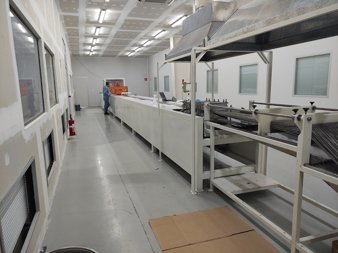Industrial pultrusion line for continuous composite profile manufacturing